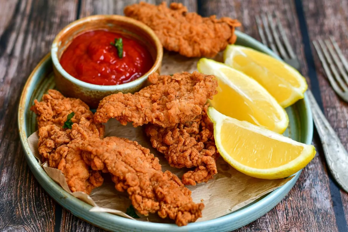 Crispy,Deep,Fried,Chicken,Strips,And,Wedges,Potato.,Breaded,With