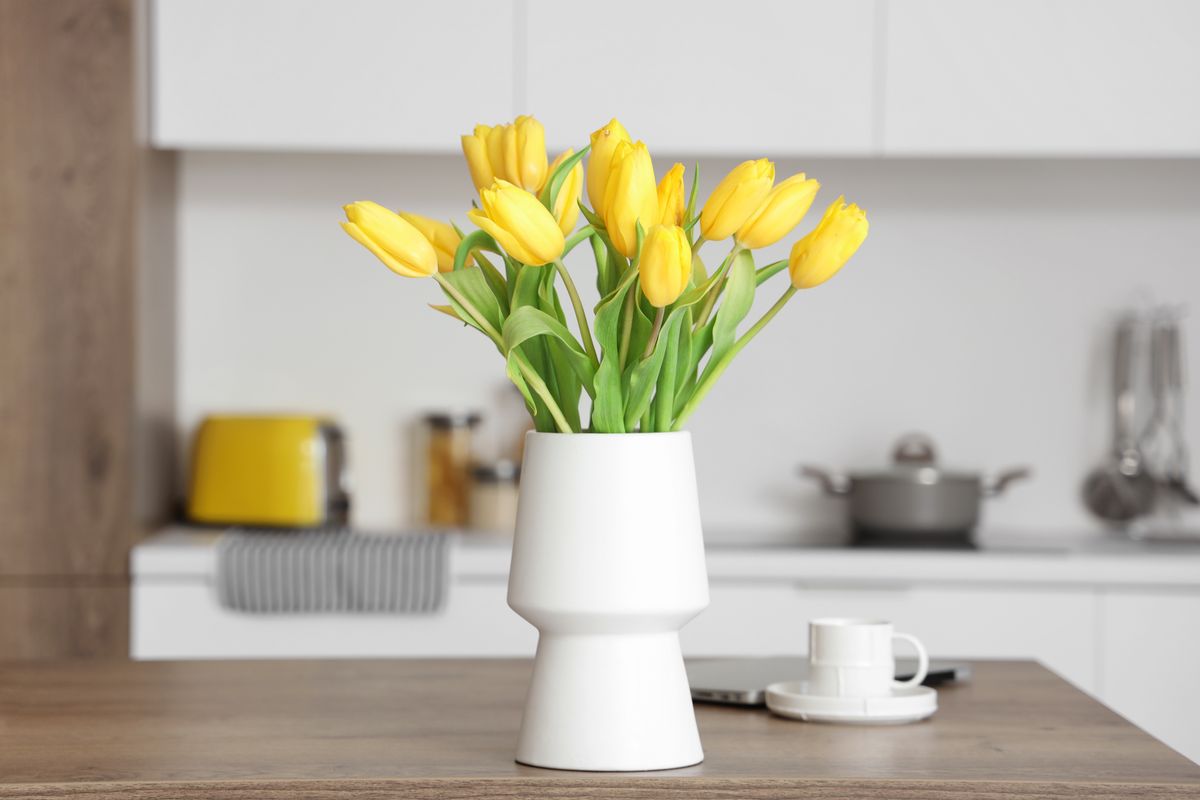Vase,With,Yellow,Tulip,Flowers,On,Wooden,Table,In,Modern