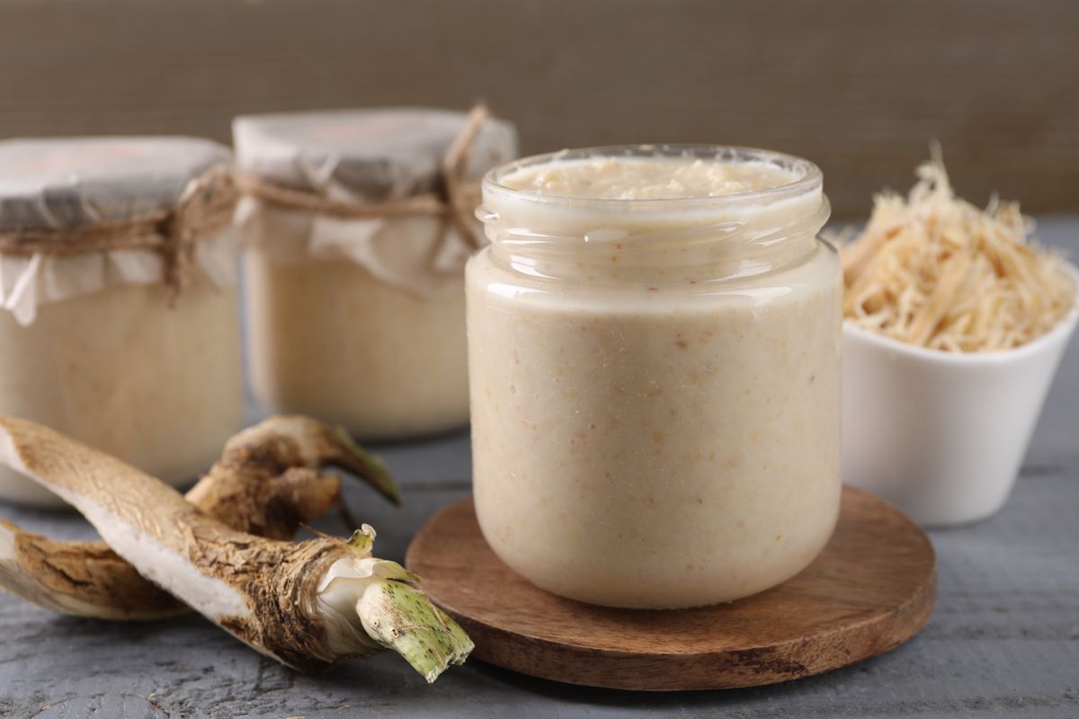Spicy,Horseradish,Sauce,In,Jar,And,Roots,On,Grey,Wooden, torma