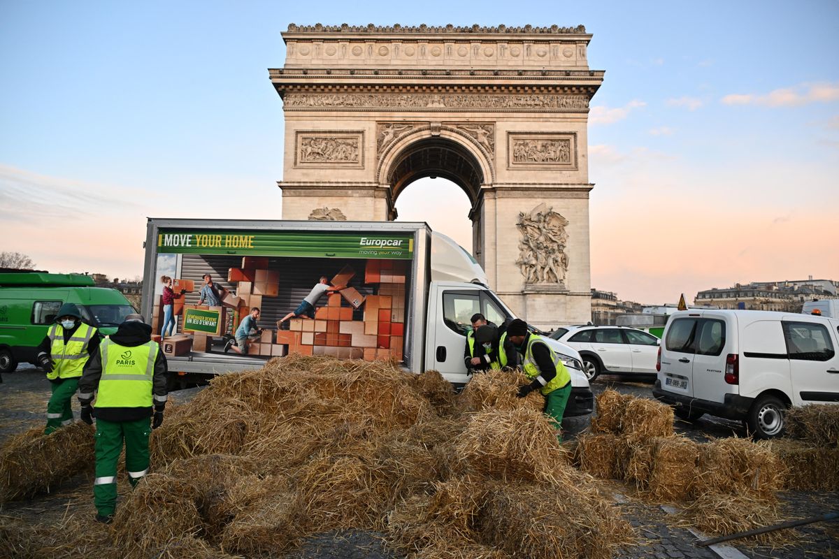 French farmers block roads with tractors in Paris