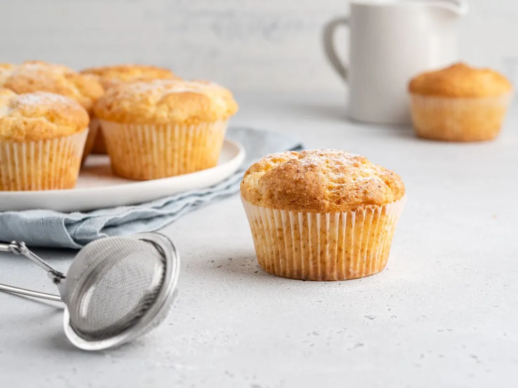 Tasty,Breakfast,Lemon,Muffins,On,A,Blue,Table,Napkin,On