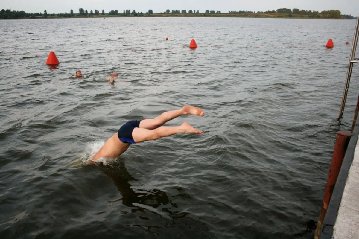 Boremel,,Ukraine,-,26,July,2008:,Young,Man,Jumping,Into