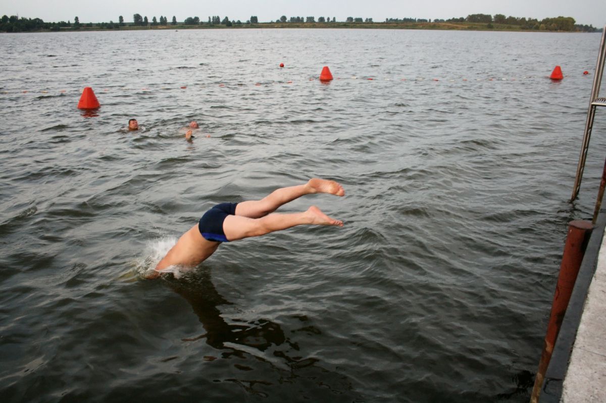 Boremel,,Ukraine,-,26,July,2008:,Young,Man,Jumping,Into