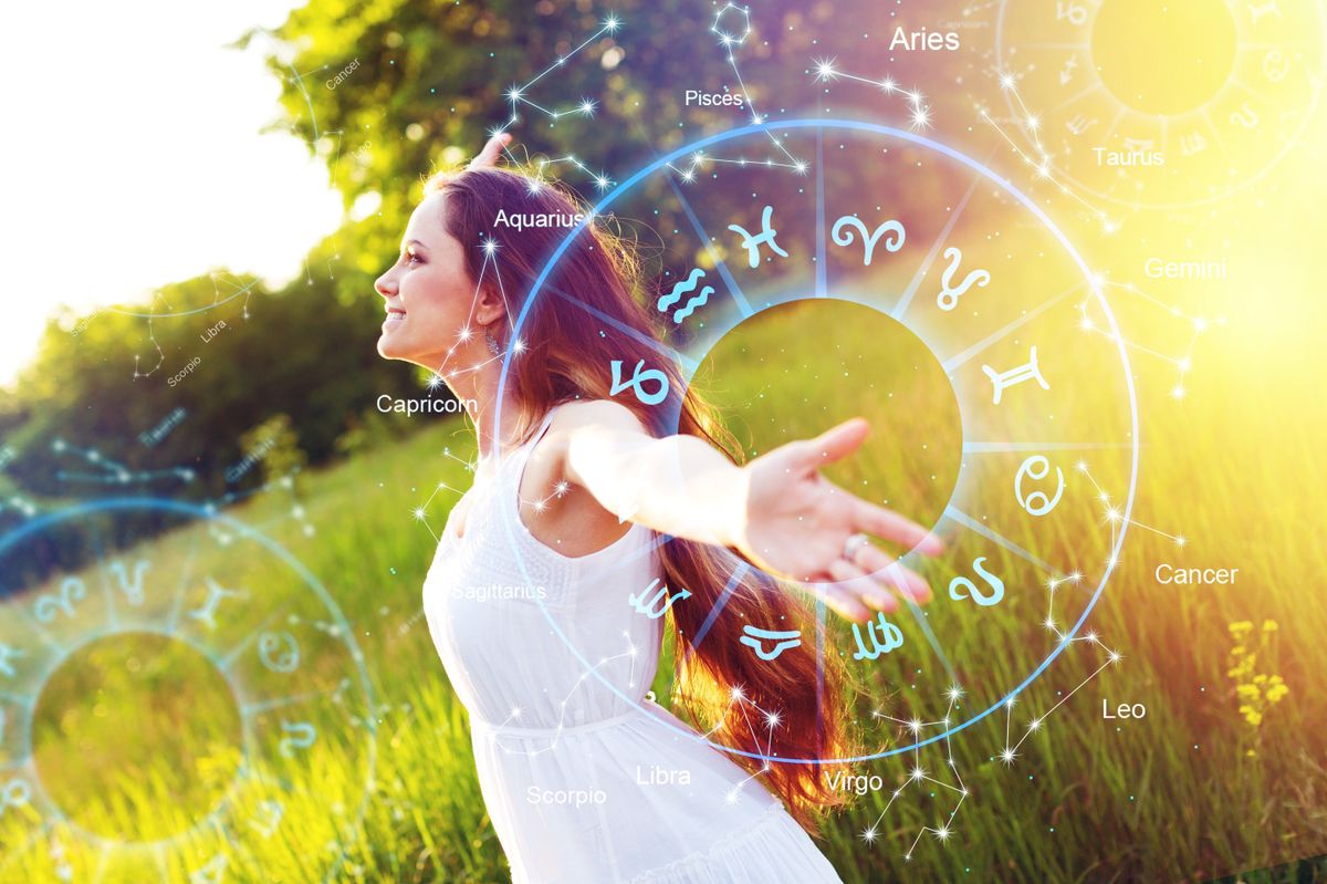 Astrology,Smartphone,App,Concept.,Woman,On,Nature,Background