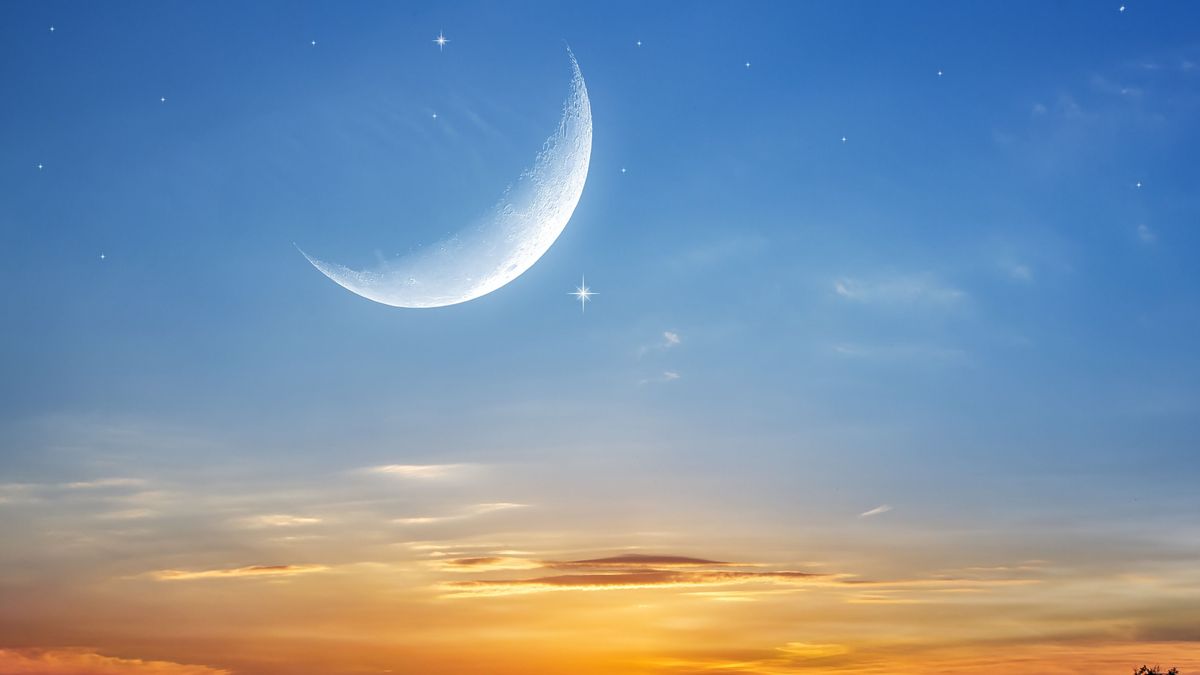 Moon,In,Bright,Clouds,Of,Sunset,Sun,.,New,Moon