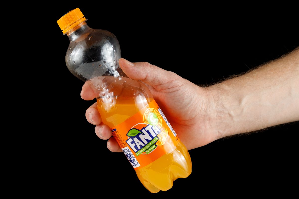 Lviv,,Ukraine,-,November,18,,2022:,Fanta,Bottle,In,Hand