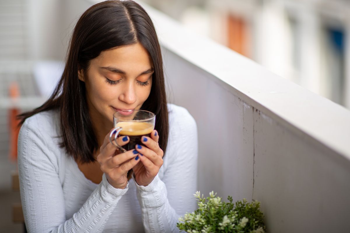 Portrait,Beautiful,Young,Woman,Smelling,Coffee