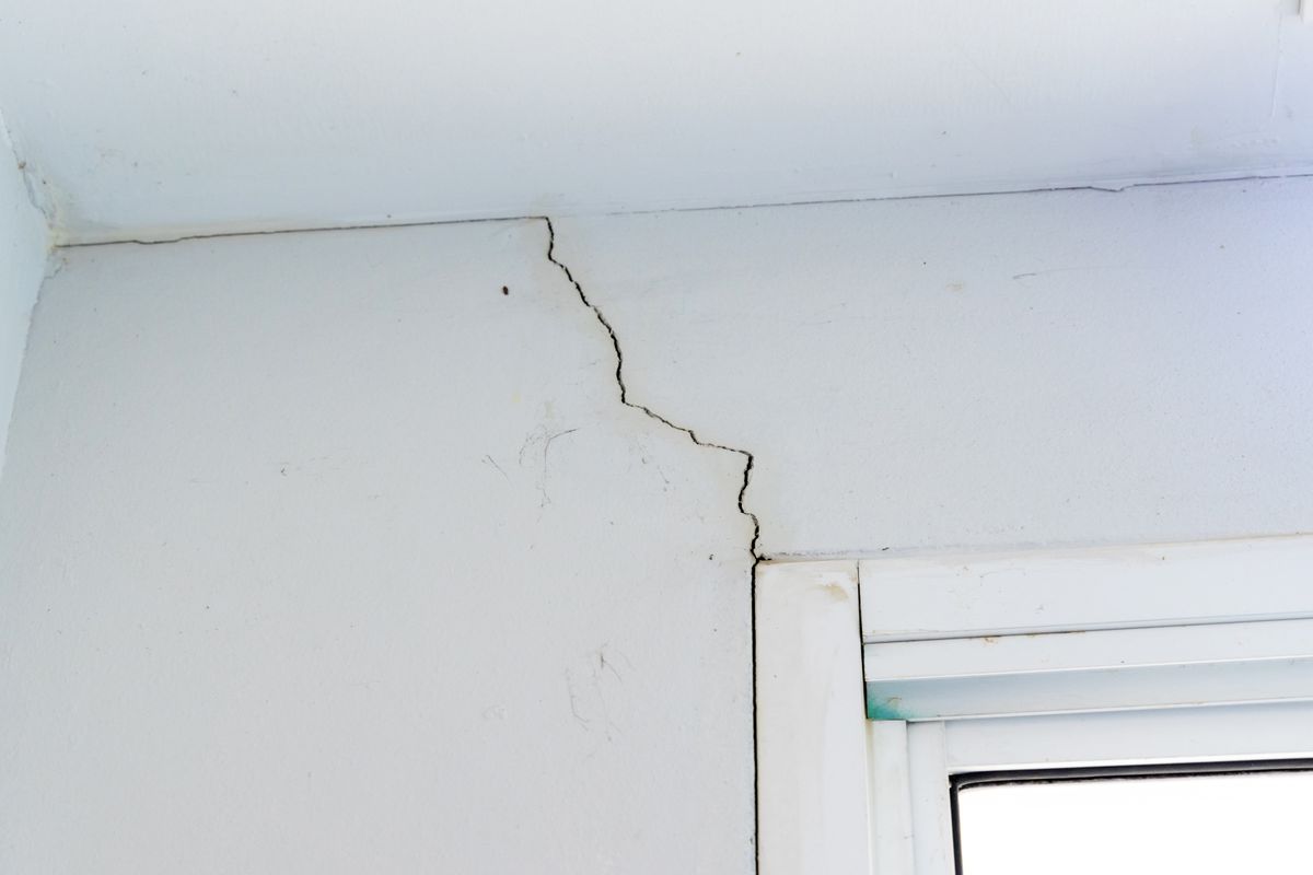 Wall,Crack,Near,Window,Frame,Corner,In,House,Or,Office