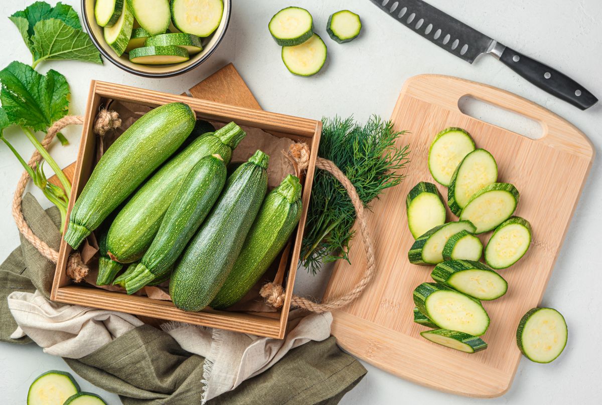 Slicing,Zucchini,On,A,Cutting,Board.,Ripe,Zucchini,On,A