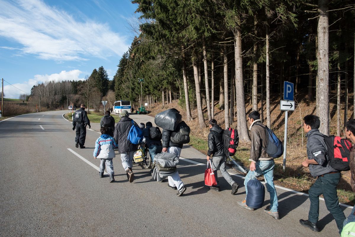 Refugees arrive at German/Austrian border