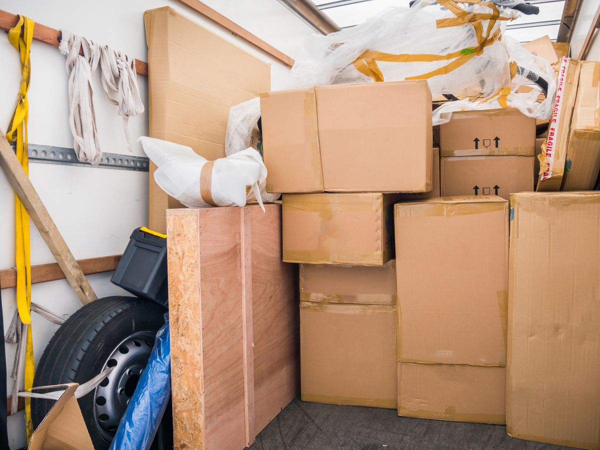 A,Removal,Van,And,Cardboard,Boxes,And,Packing,Materials.,Concept