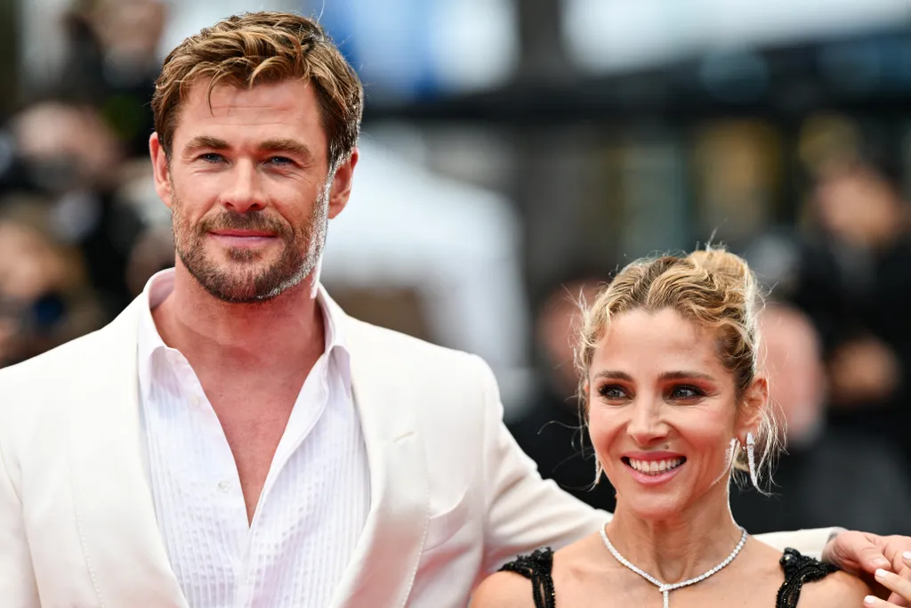 Az utóbbi időben felmerült az a pletyka, hogy a házaspár válik. Chris megcáfolta ezt, sőt most kevesebb munkát vállal, hogy a családjával lehessen. (Fotó: AFP)