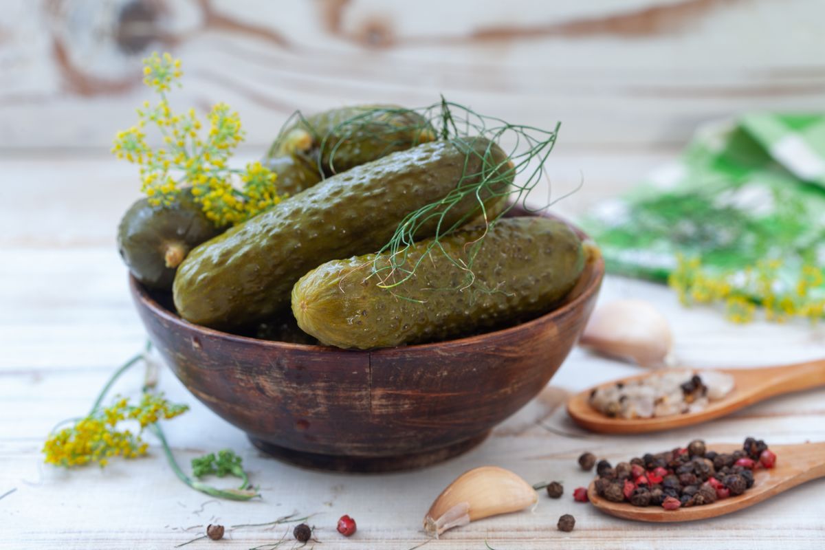 Bowl,Of,Tasty,Pickled,Cucumbers,With,Spices,And,Dill,On