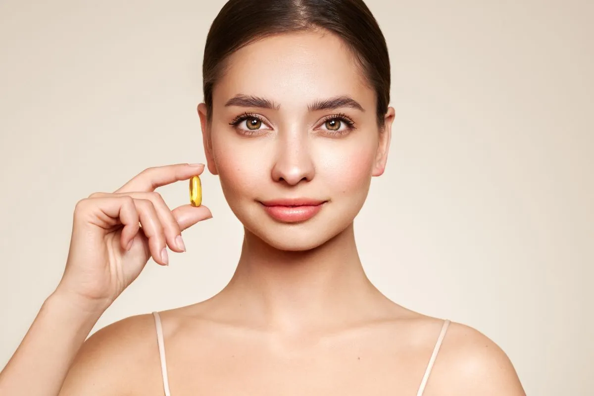 Vitamins.,Close,Up,Of,Happy,Beautiful,Girl,With,Pill,With