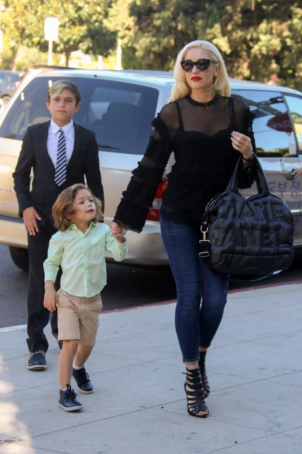 Gwen Stefani attends Sunday church service with her boys