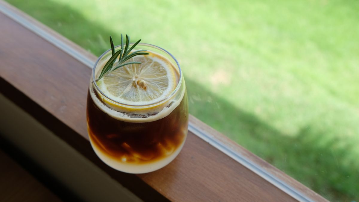 Espresso,Romano,Coffee,Serve,With,Lemon,And,Rosemary,green,Background,,grass