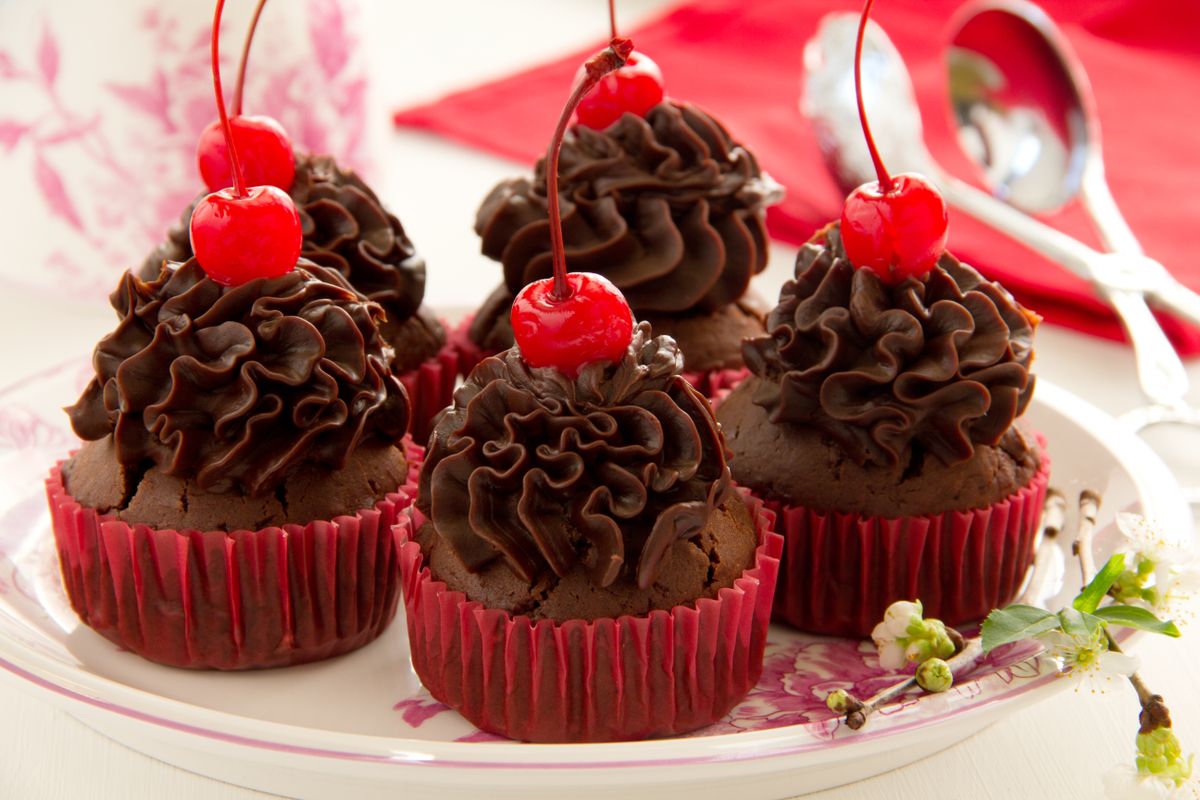 Fresh,Chocolate,Muffins,With,Chocolate,Cream,And,Cherry.