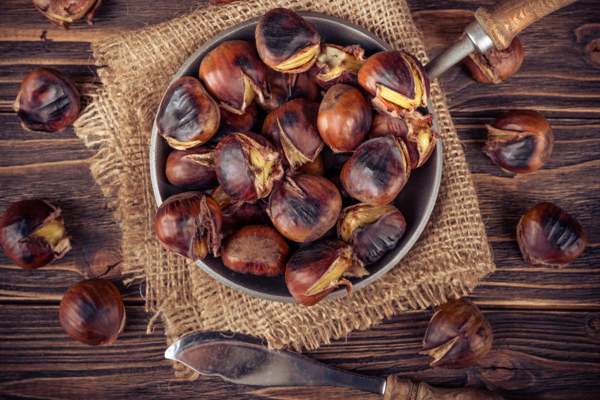 Chestnuts,In,A,Pan,On,A,Wooden,Background