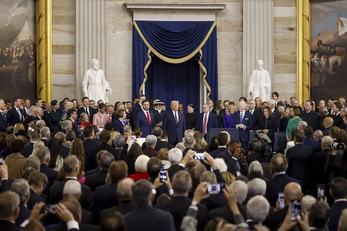 US President-elect Donald Trump (C) arrives to his inauguration ceremony in the US Capitol Rotunda in Washington, DC, on January 20, 2025. (Photo by SHAWN THEW / POOL / AFP)