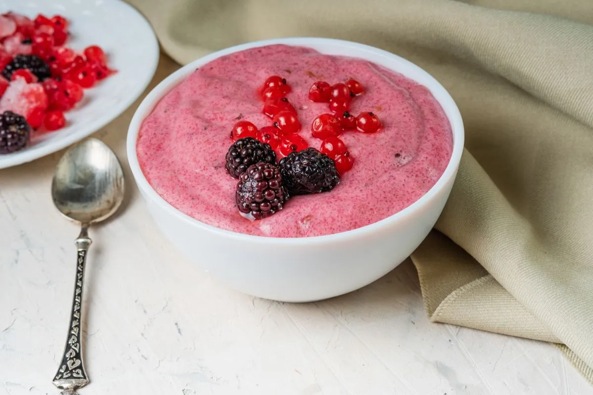 Eperhab Semolina,Pudding,With,Currant,Berries,And,Blackberries,In,A,White