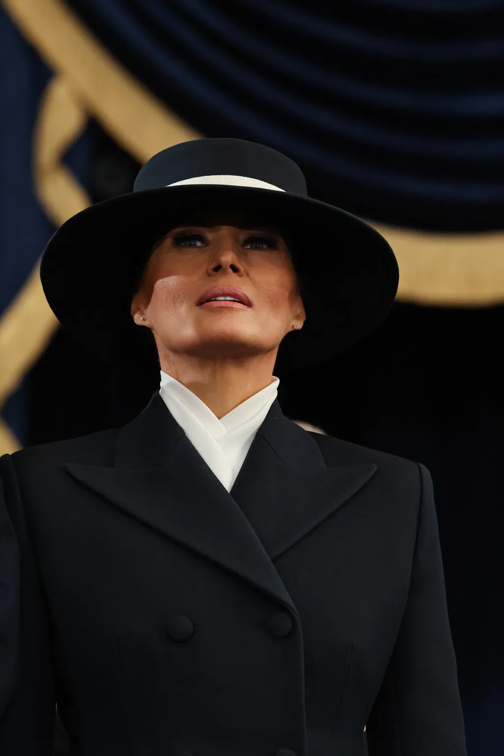Melania Trump arrives to attend the inauguration of US President-elect Donald Trump in the Rotunda of the US Capitol on January 20, 2025 in Washington, DC. Donald Trump takes office for his second term as the 47th president of the United States. (Photo by Chip Somodevilla / POOL / AFP)