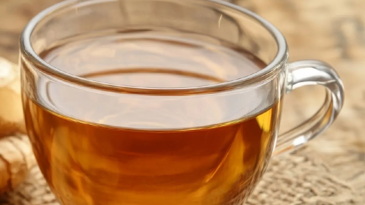Ginger,Tea,With,Sliced,Ginger,On,Wooden,Table