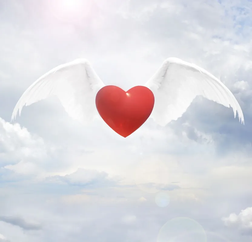 angyali üzenet Heart,With,Angel,Wings,On,Sky,Background