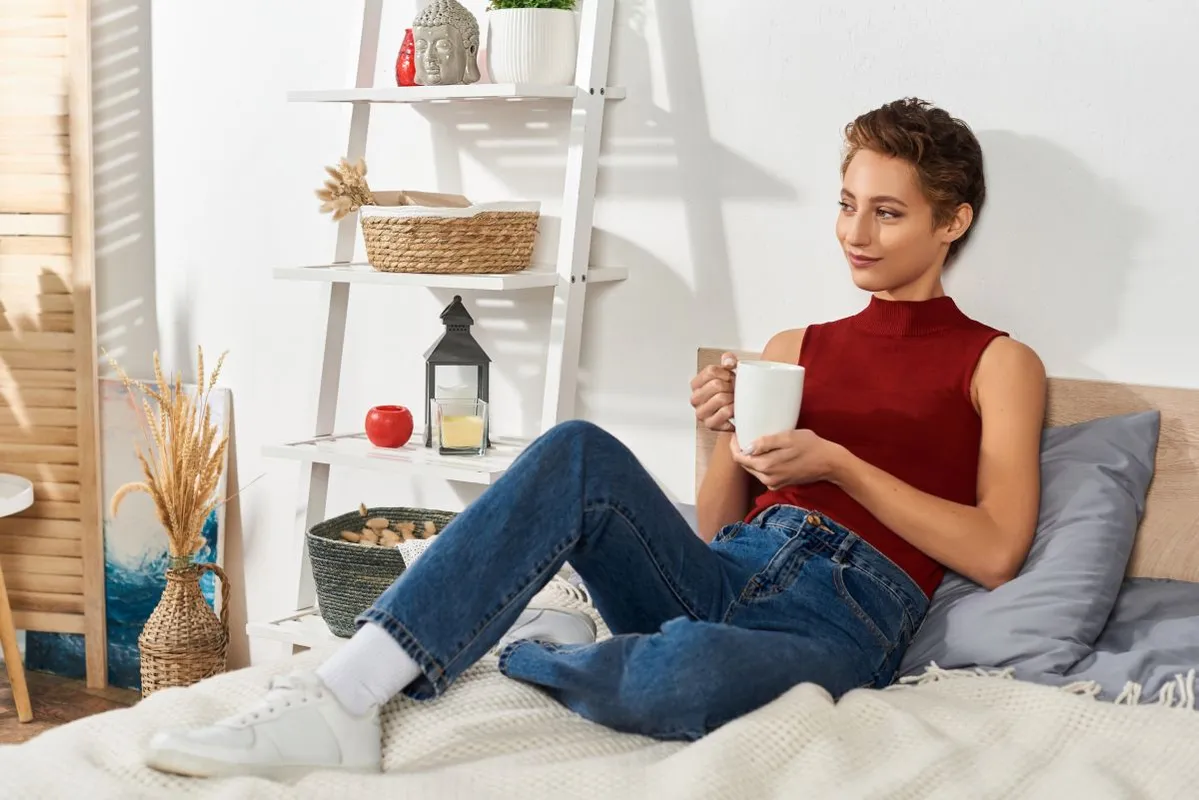 Frizura A,Young,Woman,In,A,Red,Tank,Top,Savors,Her