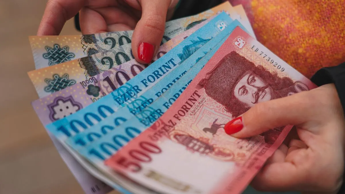 Hungarian,Forint,Holding,In,Hand