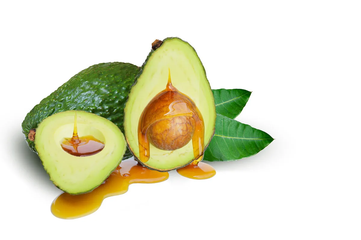 Avocado,Fruits,Salad,Cut,Haft,Section,With,Honey,Bee,Juicy