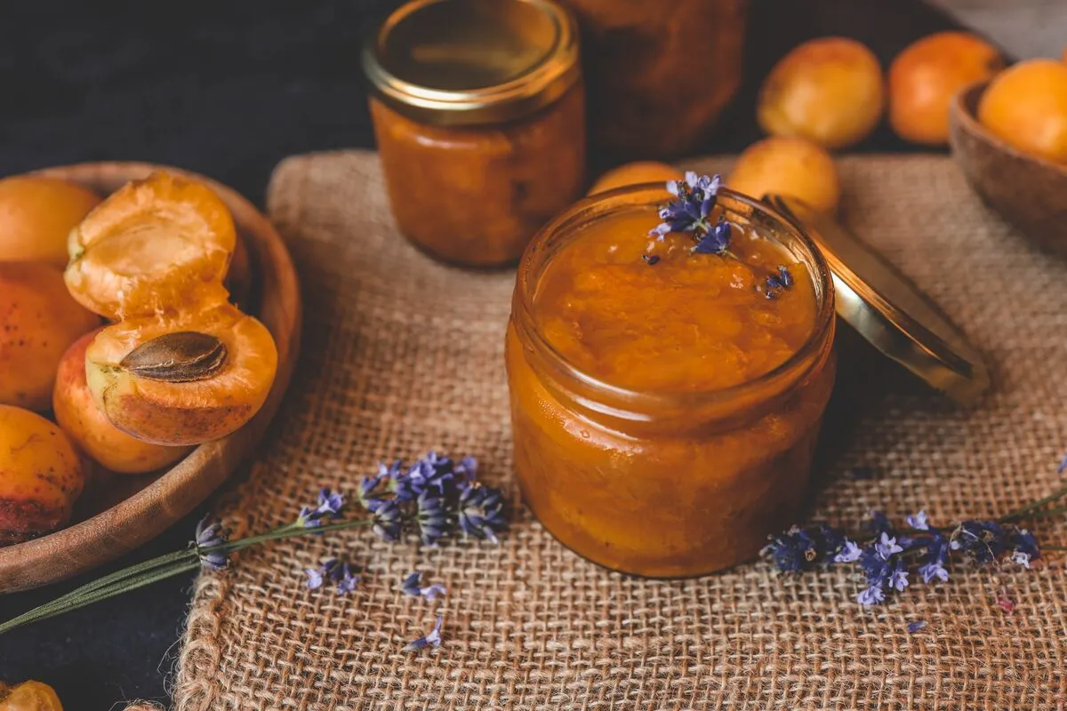 Sárgabaracklekvár Homemade,Apricot,Jam,With,Lavender,Flowers,,Surrounded,By,Fresh,Apricots