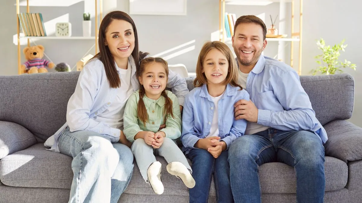 Happy,Loving,Family,Portrait,,Smiling,Bonding,Mother,And,Father,With