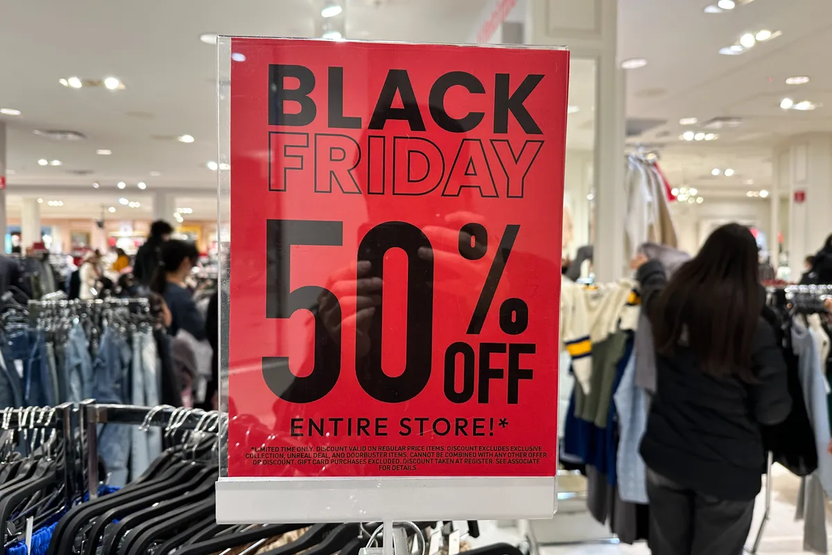 Black Friday deals advertising is seen at the storefront