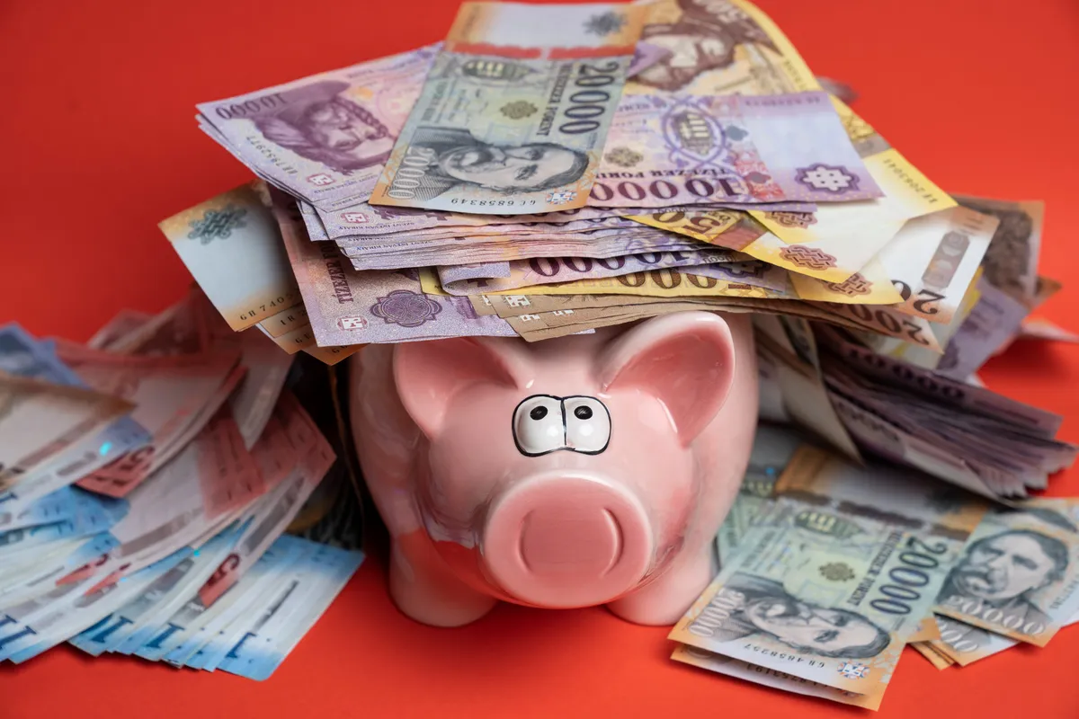 Hungarian,Forint,(huf),Money,Scattered,On,The,Wooden,Table,In