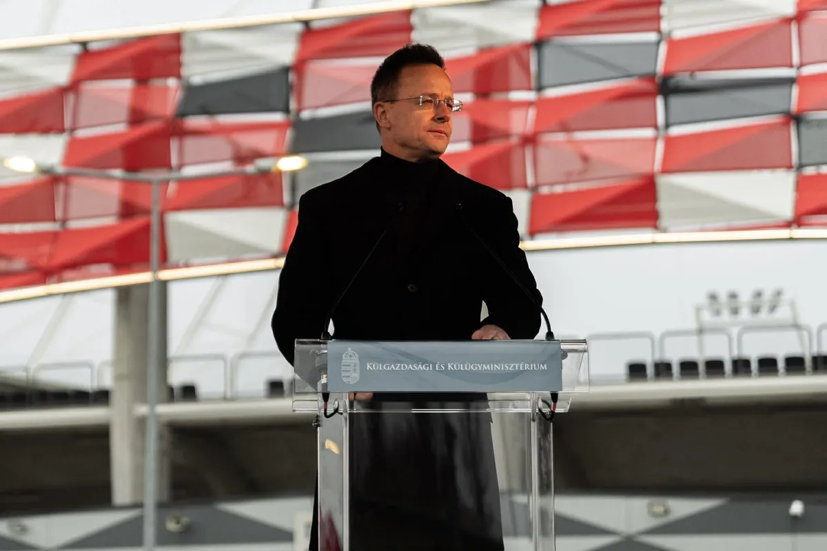 Szijjártó Péter a Bozsik Aréna előtt