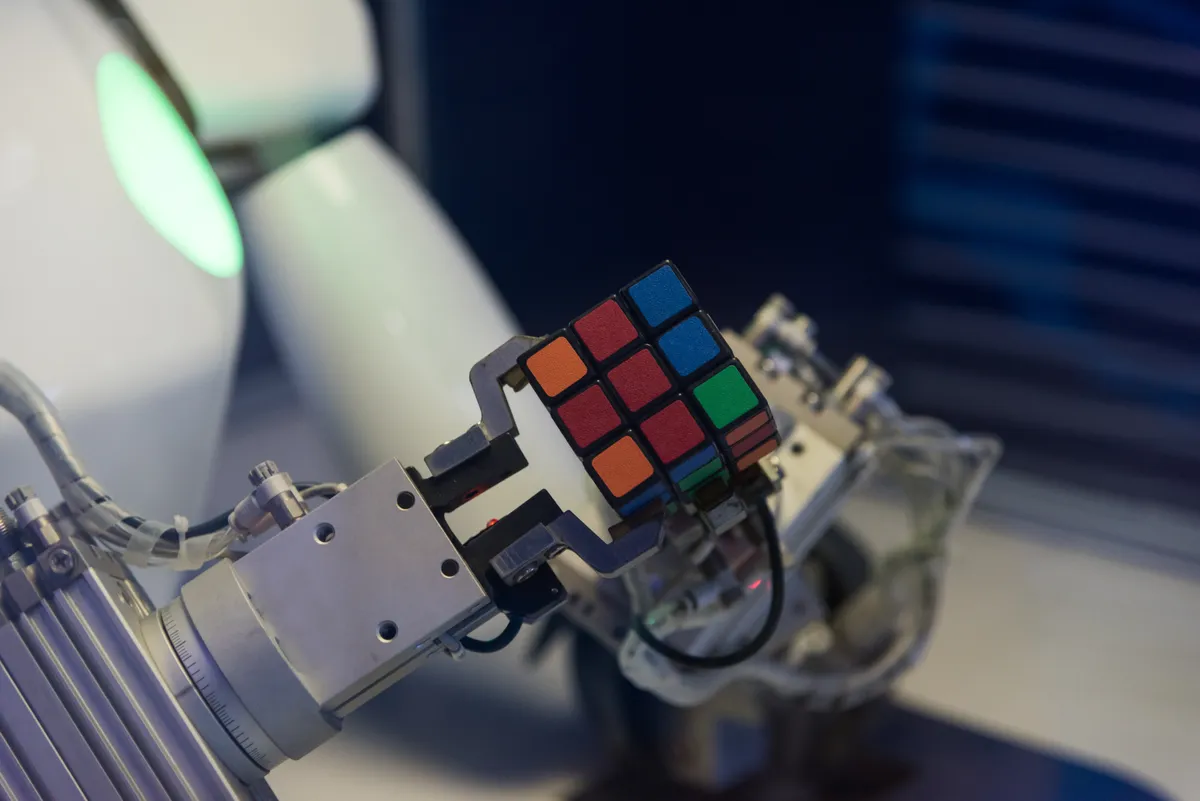 Robot,Arm,Playing,Rubik's,Cube,Close-up,,Nanning,,China,,October,2019,
