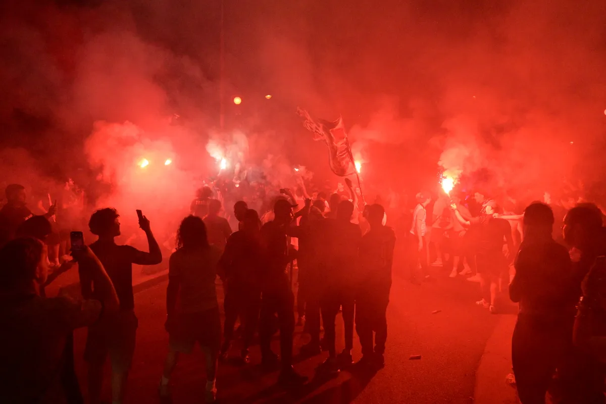 PSG fans clash with police in Paris during UEFA Champions League victory celebrations