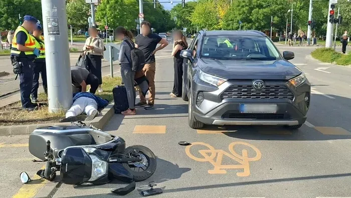 Telefonálgatással okozott motorbalesetet a gyalogos Újbudán