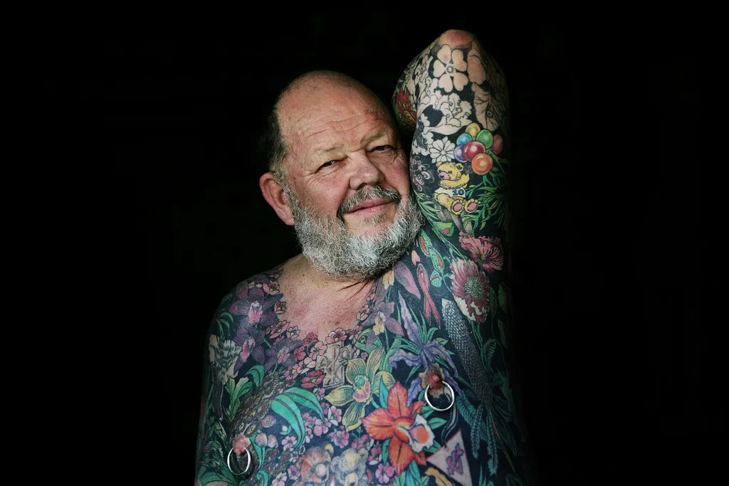 Retired teacher Geoff Ostling displays his tattooed skin at a portrait session at his home in Petersham on May 11, 2009 in Sydney, Australia. The 65-year old has pledged to donate his skin to the National Gallery in Canberra after his death. Ostling, who