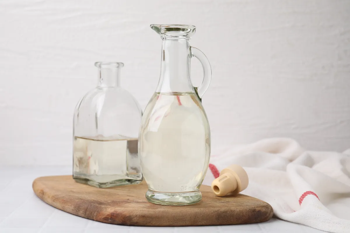 Ecet Vinegar,In,Glass,Jug,And,Bottle,On,White,Table